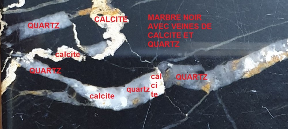 marbre_noir_avec_veines_de_calcite_et_quartz.jpg